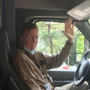Interior of Bus with Driver Waving Hello