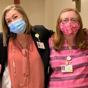 happy staff members of Roland Park Place wearing masks