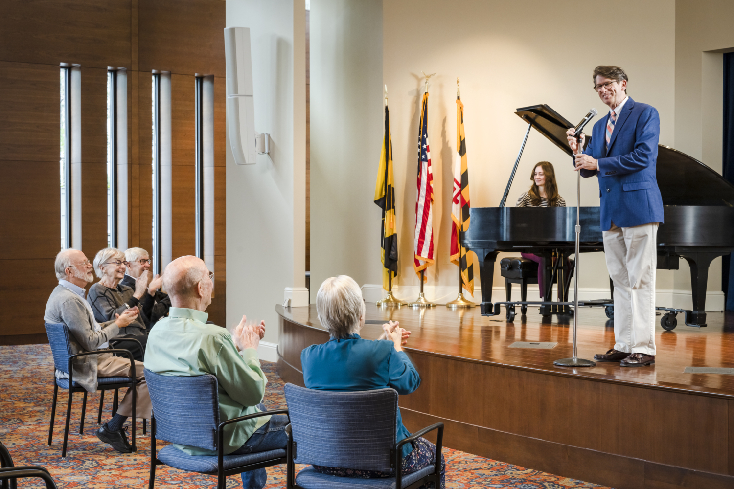 photo of a group of seniors enjoying a presentation at Roland Park Place in Baltimore