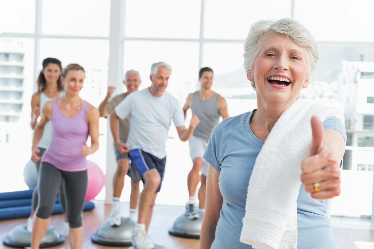 Image of a group of older adults in a fitness class.