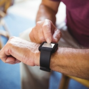 Senior man wearing a smart watch.