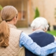 Image of a caregiver with a senior that has dementia.