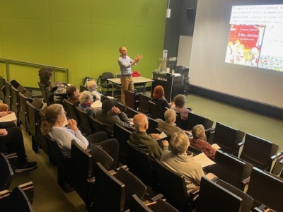 art professor giving lecture to audience